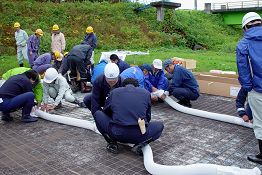 大仙市藤木字丙大久保地内出川河川公園の訓練風景